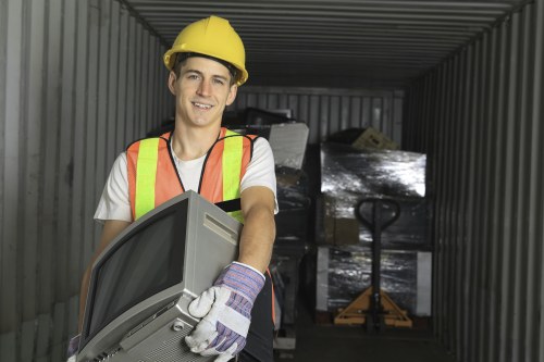 Handyman preparing furniture for recycling in Shepherds Bush