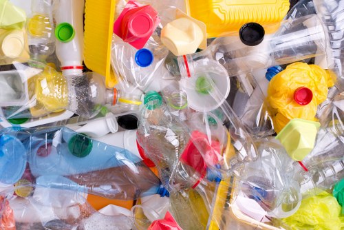 Workers sorting recyclables at a transfer station near White City